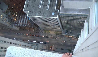 Amateur slut blowing cock and swallowing cum on the edge of 100th floor