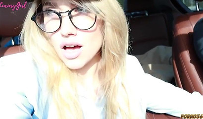 Russian girlfriend with sexy eyeglasses blowing off her boyfriend in the car