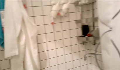 Brunette slut with glasses sucks dick in supermarket's toilet
