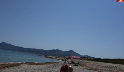 Hottie in black bikini sucking her boyfriend's fat dick on the beach