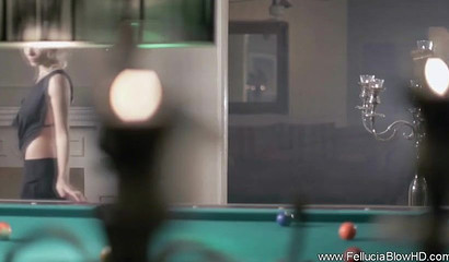 Attractive babe blows gangster's hard sausage by the pool table