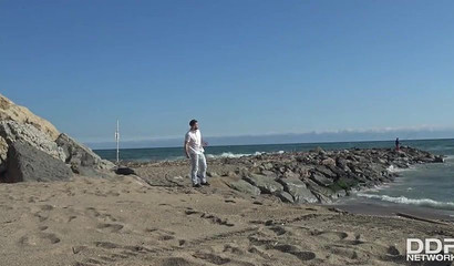 Ebony with big fake tits Noemilk sucks white knob outdoors