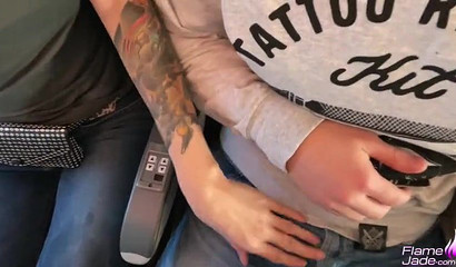 Busty and inked purple-haired diva swallowing dick on the plane