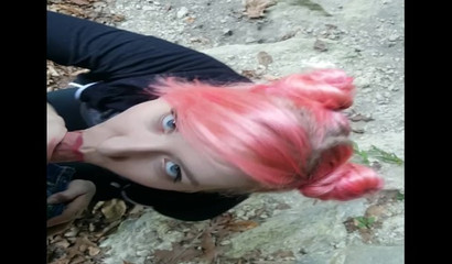 Pink-haired vixen decides to blow off her man in the woods