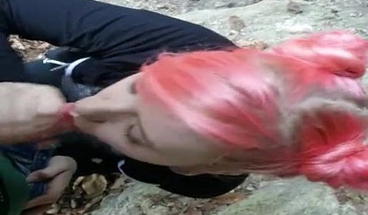 Pink-haired vixen decides to blow off her man in the woods