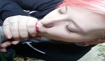 Pink-haired vixen decides to blow off her man in the woods