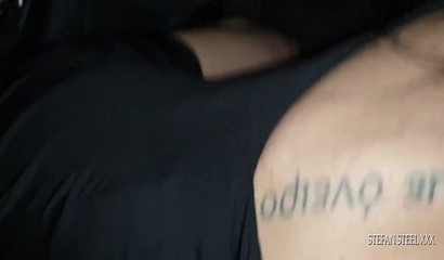 Gorgeous brunette sweetie giving her man a sloppy blowjob in the car