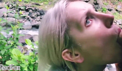 Blonde Russian teen performing a sizzling blowjob outside