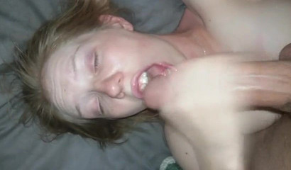 Slutty amateur girl worships a huge dick and receives jizz on her face