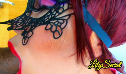 Masked babe Lily Secret sucking a huge dick and balls