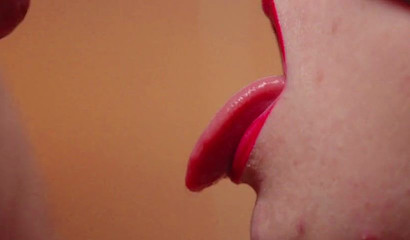 Masked mistress wraps her sexy lips around a dick and blows it