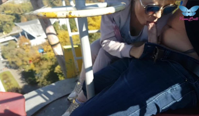 An exciting ferris wheel blowjob recorded as the ride is in session
