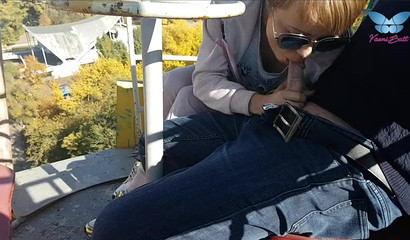 An exciting ferris wheel blowjob recorded as the ride is in session