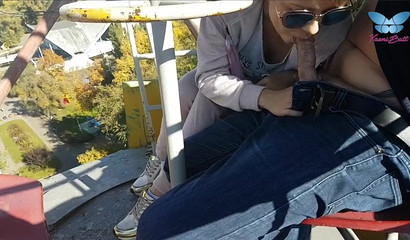 An exciting ferris wheel blowjob recorded as the ride is in session