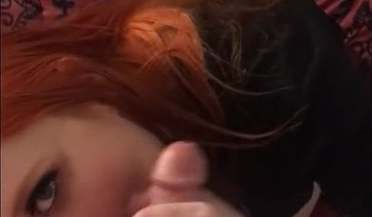 Redheaded beauty gives mind-blowing oral pleasure