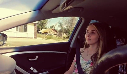 Sasha Paradise leans over and starts sucking the dude who is driving