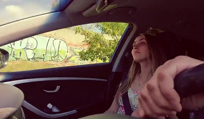 Sasha Paradise leans over and starts sucking the dude who is driving