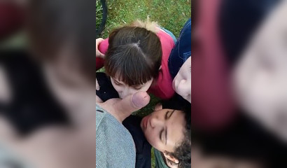 Three girls one guy in a public blowjob session