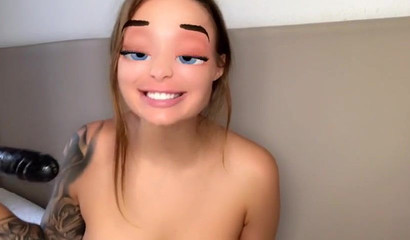 Blonde stretches her throat and holes with her black dildo