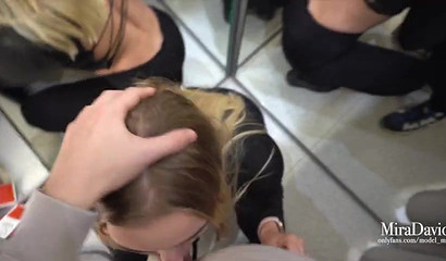 A superb close-up of a blonde beauty licking and sucking in a dressing room