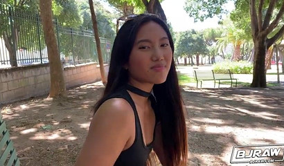 Asian beauty May Thai strips and worships a huge dick