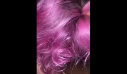 Pink-haired nympho feeds herself with a BBC