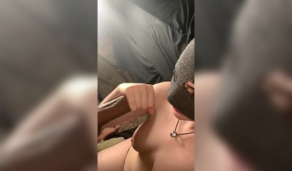 Masked cutie gagging on a big black dick