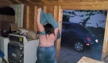 Chubby slut strips, kneels down and blows a boner