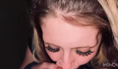 Blonde with a nose ring licking and blowing a nice white dick