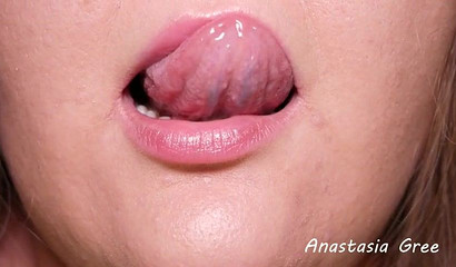 Fat babe seductively licks her sexy lips