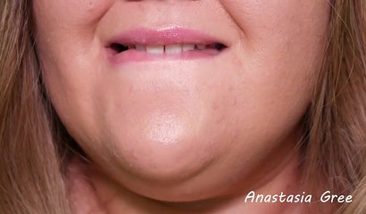 Fat babe seductively licks her sexy lips