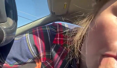 Slutty teen blows a boner up close in the car
