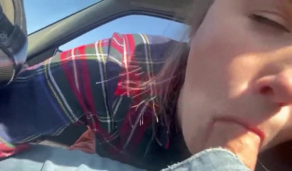 Slutty teen blows a boner up close in the car