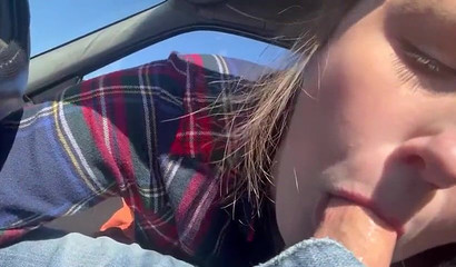 Slutty teen blows a boner up close in the car