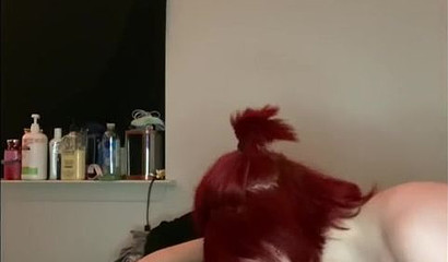 Redheaded doll knows how to make a hard dick cum