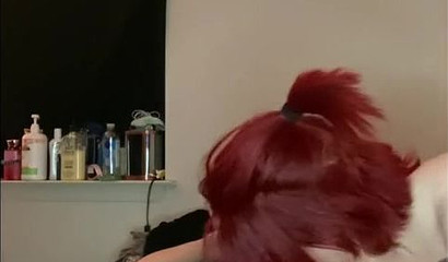 Redheaded doll knows how to make a hard dick cum