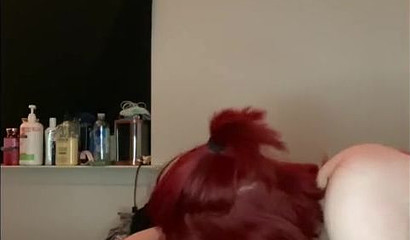 Redheaded doll knows how to make a hard dick cum