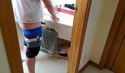 Sucking a large cock on the bathroom floor made the brunette happy