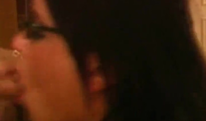Beautiful Latina MILF with glasses gives a POV blowjob and gets facialized