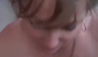 Beautiful amateur cougar with big tits blowing stiff rod in POV