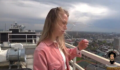 A romantic rooftop BJ where she happily swallows his load