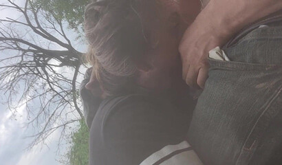 Amateur Brunette MILF Deepthroats Outdoors by the River