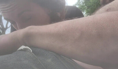Amateur Brunette MILF Deepthroats Outdoors by the River