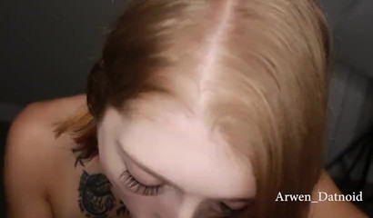 Redhead hottie Arwen Datnoid looks me in eyes while sucking my thick cock