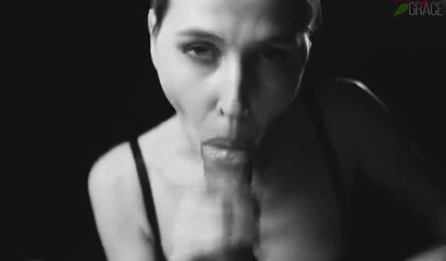 Horny babe Cherry Grace gives passionate blowjob in black and white