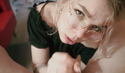 Cute teen blonde with glasses blowing cock and teasing her man