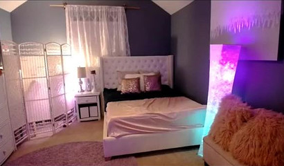 Blonde cam girl shows off her big tits and toys her mouth