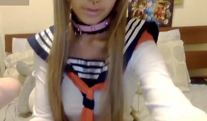 Asian schoolgirl with a nose ring deepthroats a huge toy
