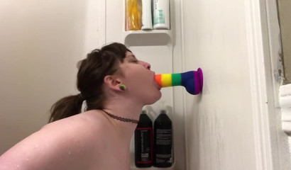 Lustful brunette pussycat tries out a new rainbow dildo
