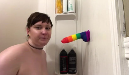 Lustful brunette pussycat tries out a new rainbow dildo